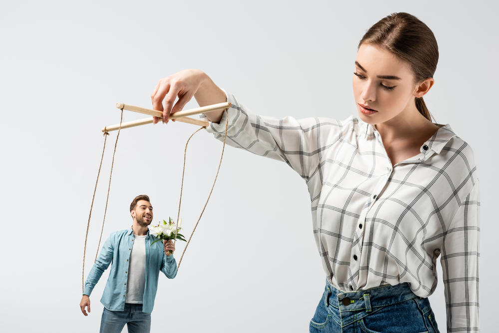 woman shown as in charge, using a man as a simple image for handling stress